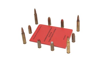 Image showing Soviet communist party membership card surrounded by cartridges isolated