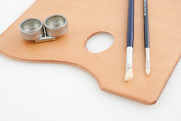 Image showing Wooden painter case with brushes