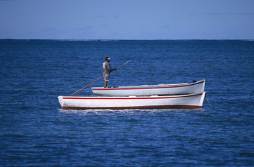 Image showing Local boats with fisherman Mauritius Island