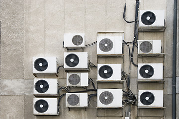 Image showing air conditioner machines on wall