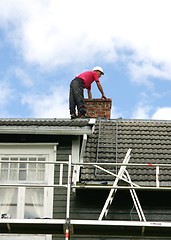 Image showing Man on the roof