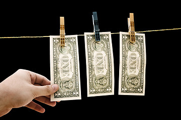 Image showing Dollars on the wire