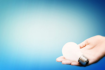 Image showing Background with lit lightbulb