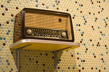 Image showing vintage radio on yellow background 