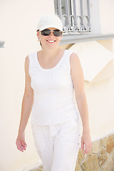 Image showing Smiling woman in white