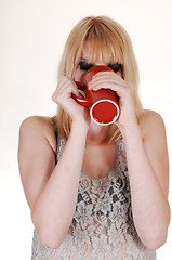 Image showing Girl thinking coffee.