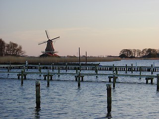 Image showing Empty Harbour with Windmill