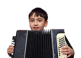 Image showing boy plays on accordion