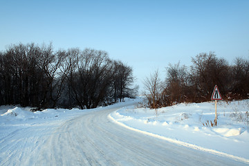 Image showing winter road with sign