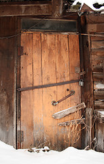 Image showing closed wooden  door of old shed