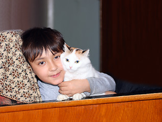 Image showing asian boy with cat