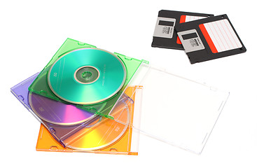 Image showing colored dvd and old floppy discs