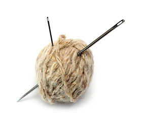 Image showing clew of wool thread and two needles