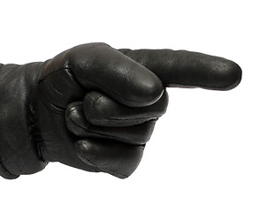 Image showing hand in black glove showing direction