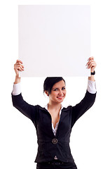 Image showing Business woman holding board