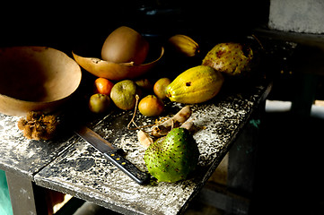 Image showing Old kitchen table with fruit 