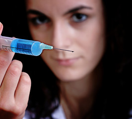 Image showing Portrait of a young doctor with syringa.