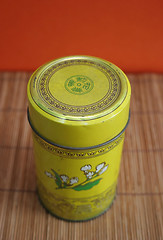 Image showing Old Chinese tea tin on bamboo - copy space
