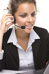 Image showing Young woman with headphone on white background