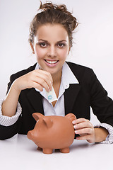 Image showing Savings - Business woman at work