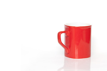 Image showing red coffee-cup on a white background