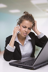 Image showing Portrait of tired secretary working in office