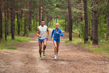 Image showing Sportsmen. The young man and the girl