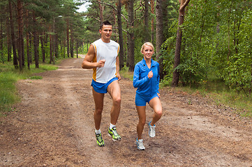 Image showing Sportsmen. The young man and the girl