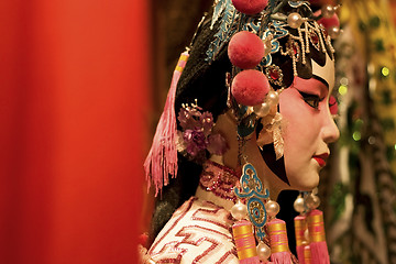 Image showing chinese opera dummy and red cloth as text space 