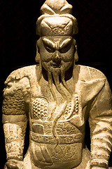 Image showing chinese sculpture man in black background