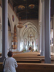 Image showing Church in Germany with womans torso in foreground