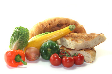 Image showing Mediterranean vegetables with pita bread