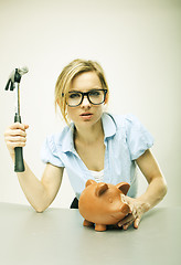 Image showing breaking a piggy bank