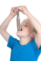 Image showing Eating a herring the Dutch way