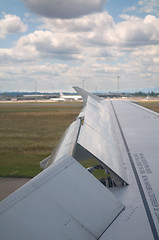 Image showing Wing of airplane landing