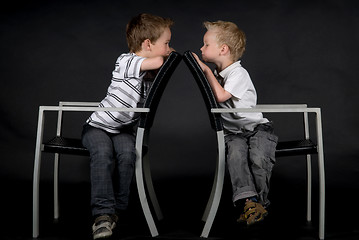 Image showing Two Brothers On A Chair