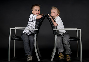 Image showing Two Brothers On A Chair