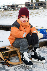 Image showing Little boy on a sled