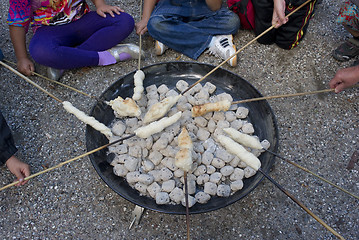 Image showing Children grilling bread