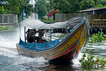 Image showing Longtail boat on a canal in Bangkok, Thailand