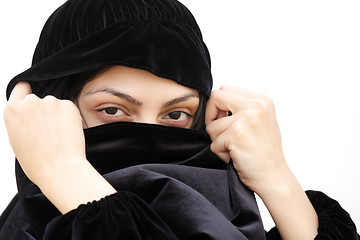 Image showing Woman in shawl covering face