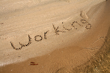 Image showing Text on the sand