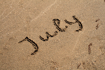 Image showing Text on the sand