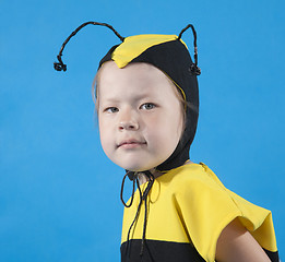 Image showing Small girl is dressed at bee costume