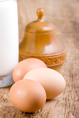 Image showing brown eggs and glass of milk