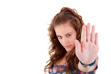 Image showing young girl  with his hand raised in signal to stop