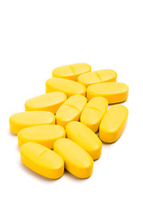 Image showing yellow vitamin pills