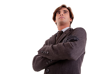 Image showing Portrait of a young businessman, looking serious, in autumn/winter clothes