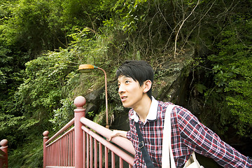 Image showing Man stand on bridge 