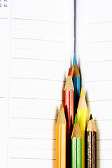 Image showing Color pencil and agenda